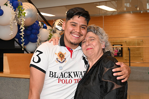 Gina Marrazza With A Student At An ACES Graduation Event